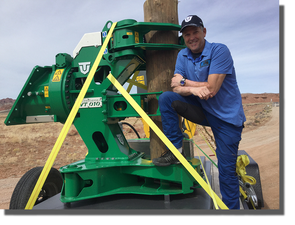 Mark Gigstad next to Tree Shear attachment